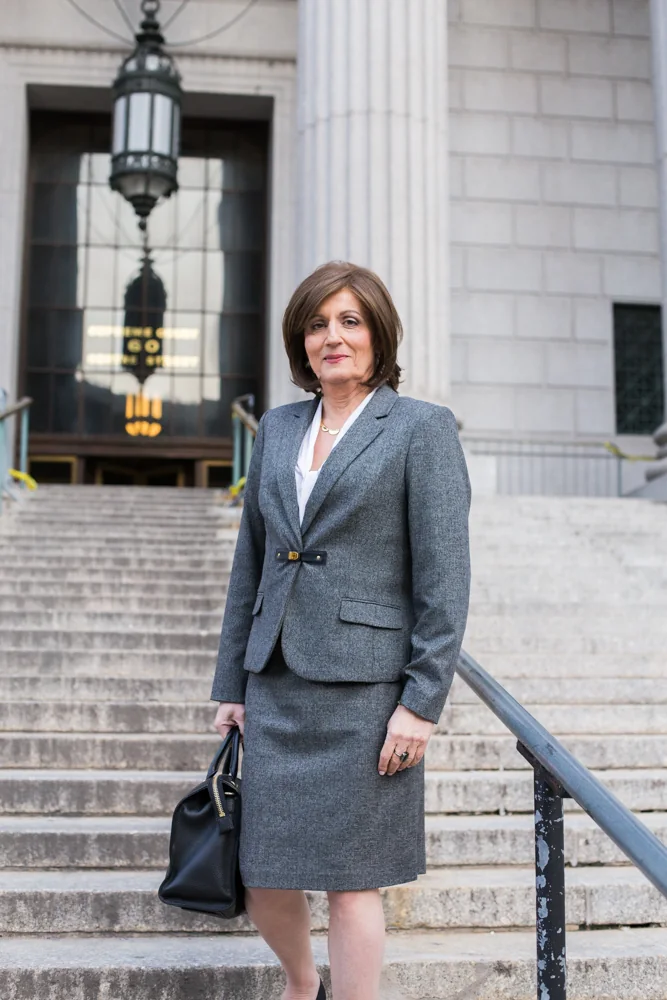 Kristen Prata Browde on the steps of the New York Supreme Court